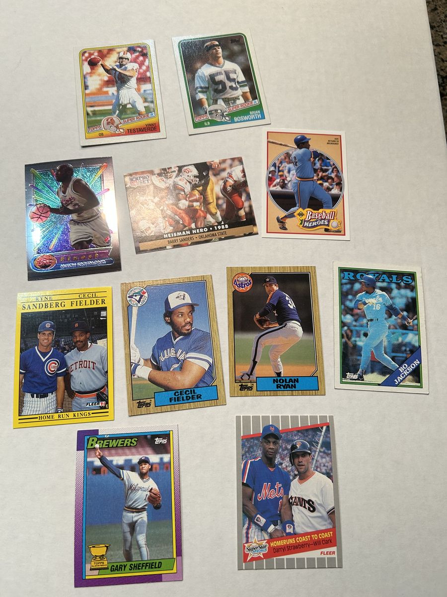 Huge box of assorted sports cards.