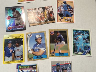 Huge box of assorted sports cards.