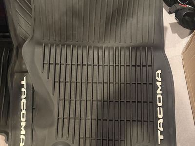 OEM Toyota Tacoma All-Weather Rubber Floor Mats & Carpet TRD Set Black. Will fit 2024- current Toyota Tacoma.