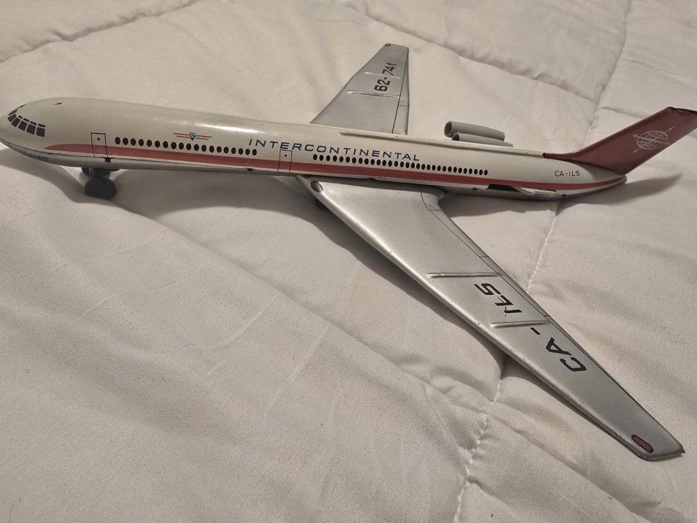 Vintage Intercontinental CA-ILS Tin Toy Airplane - 62-741 Model with Wheels
