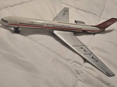Vintage Intercontinental CA-ILS Tin Toy Airplane - 62-741 Model with Wheels