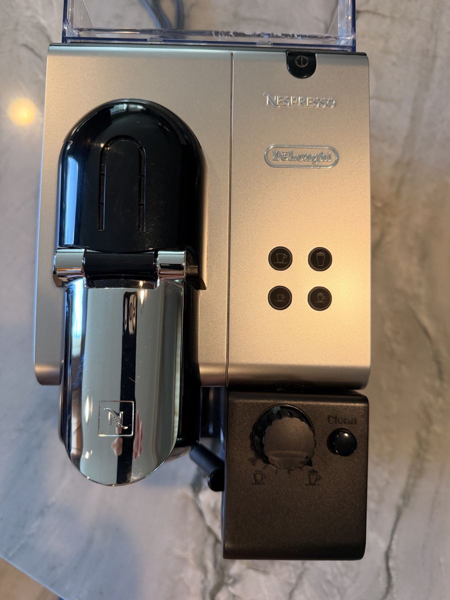 DeLonghi Nespresso machine with milk frother