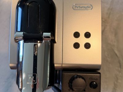 DeLonghi Nespresso machine with milk frother