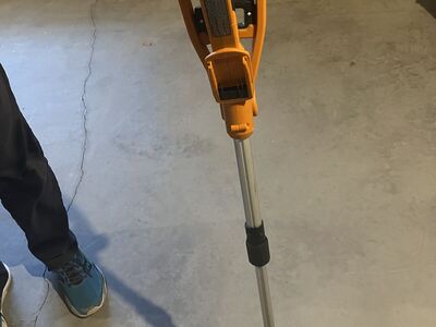 Battery powered trimmner by Worx. Comes with battery and plug in charger