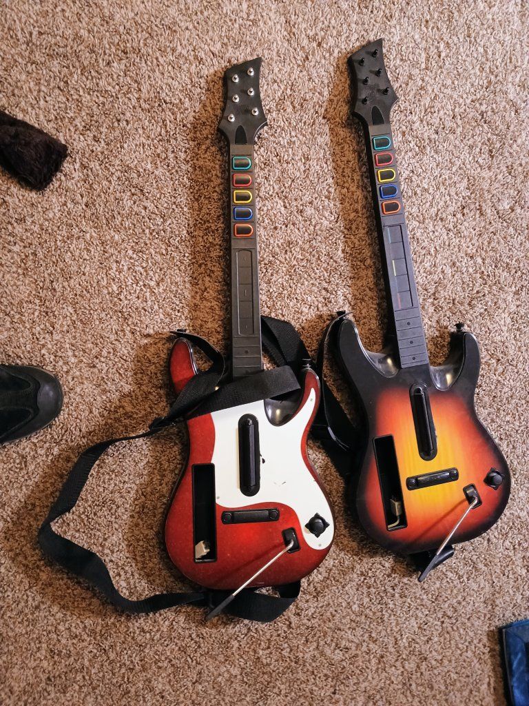 Pair of Wii Guitar Hero Controllers - Red/White + Sunburst