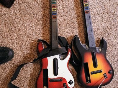 Pair of Wii Guitar Hero Controllers - Red/White + Sunburst