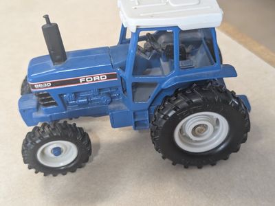 vintage die cast tractor. like new only used for display