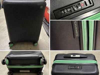 Hard -shell carry-on suitcase