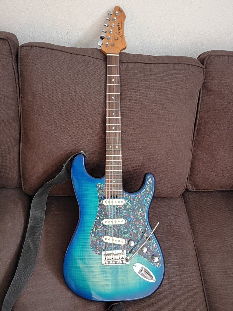 Firefly stratocaster with fender pickups