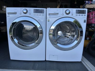 LG White Front Load Washer & Electric Dryer Set - Stackable, Sensor Dry, Direct Drive