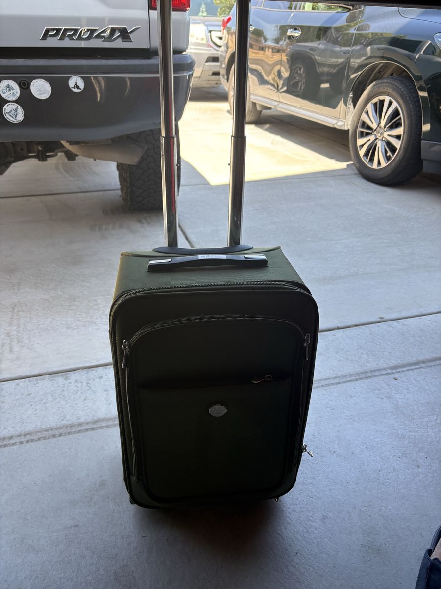 Unicorn Print Rolling Carry-On Luggage and green Carry on luggage. Can purchase separate or together.