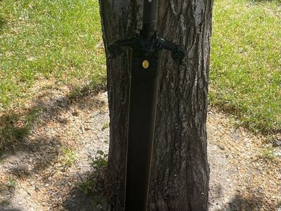 Large black handle Damascus sword