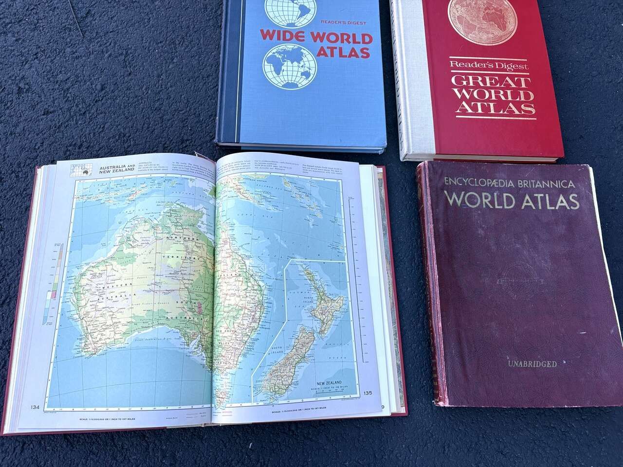 Huge, vintage / antique world atlas books. Awesome coffee table decoration.