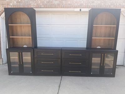 Modern Black Arched Entertainment Center with Bookshelves, Cabinets, and Drawers