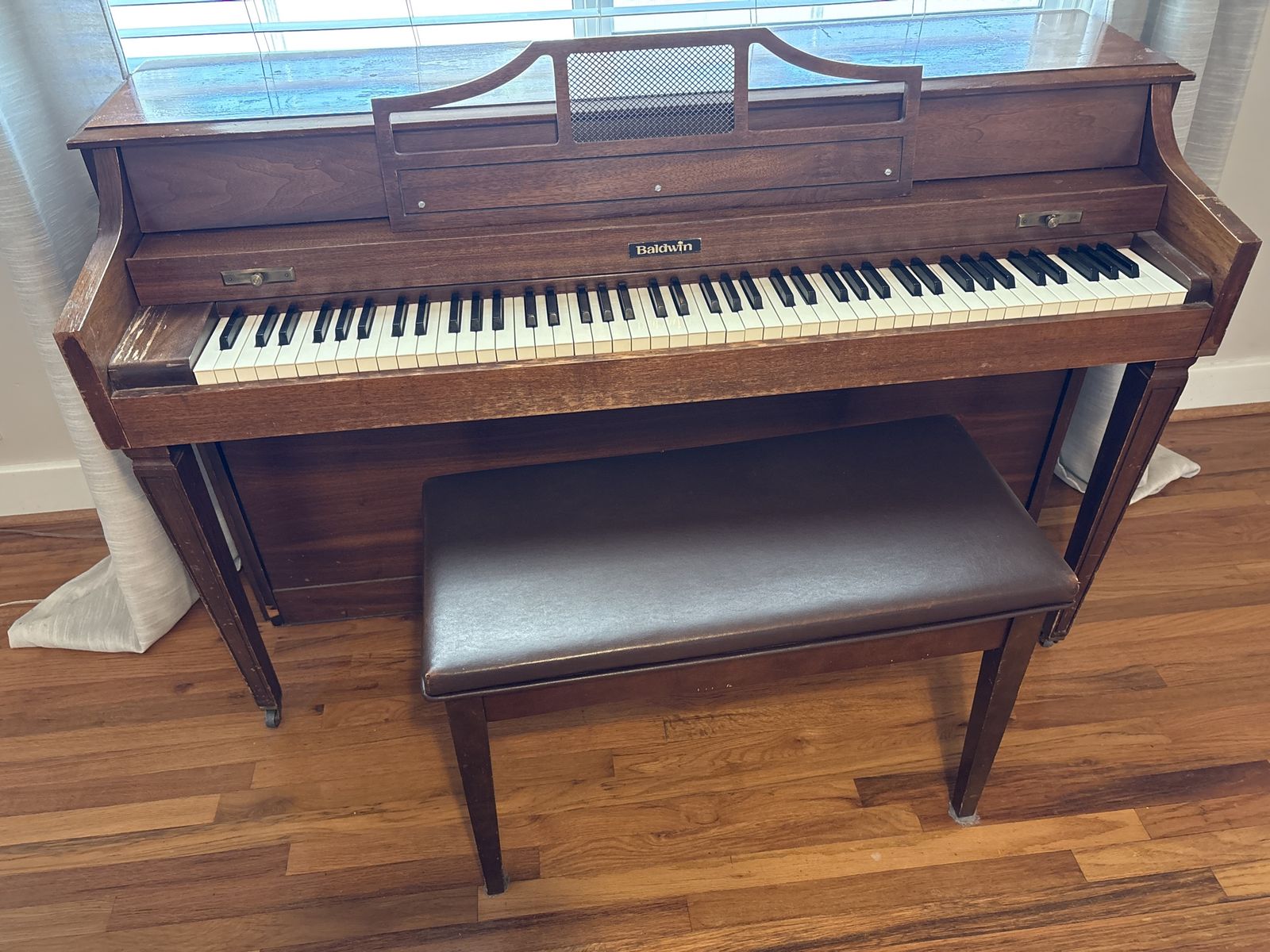Free Piano with bench  - needs a tune. Must be collected