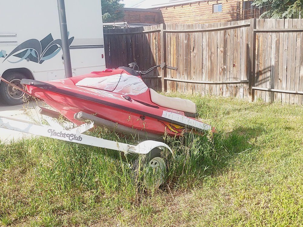 Red Personal Watercraft (PWC) with Yacht Club Trailer