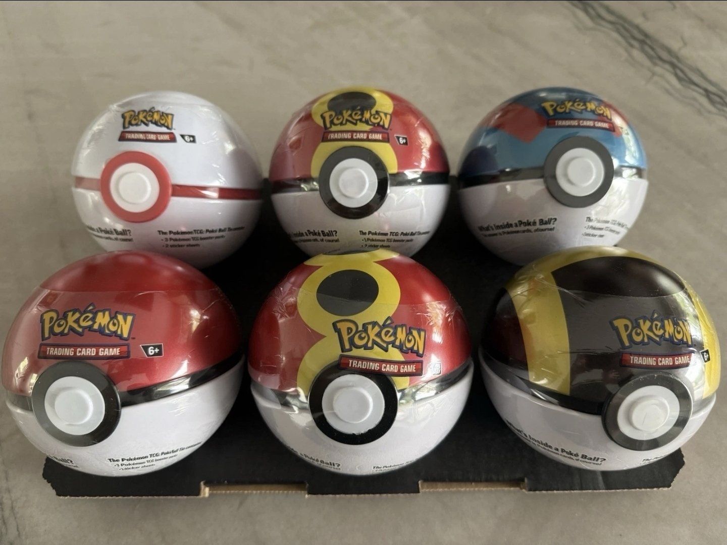 6 X Pokemon Tcg Pokeball Tins - 18 Booster Packs