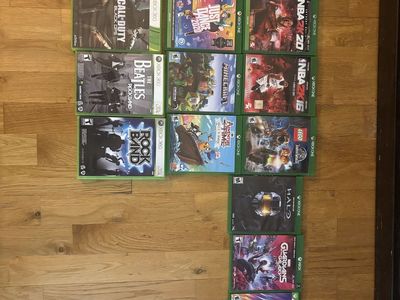 Xbox with controllers and games