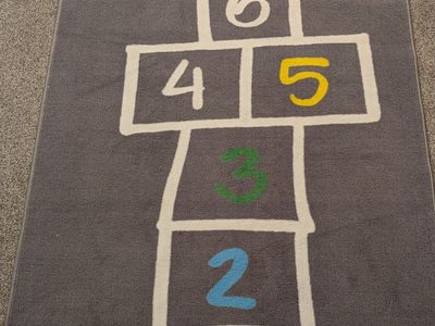 Hop scotch indoor play rug