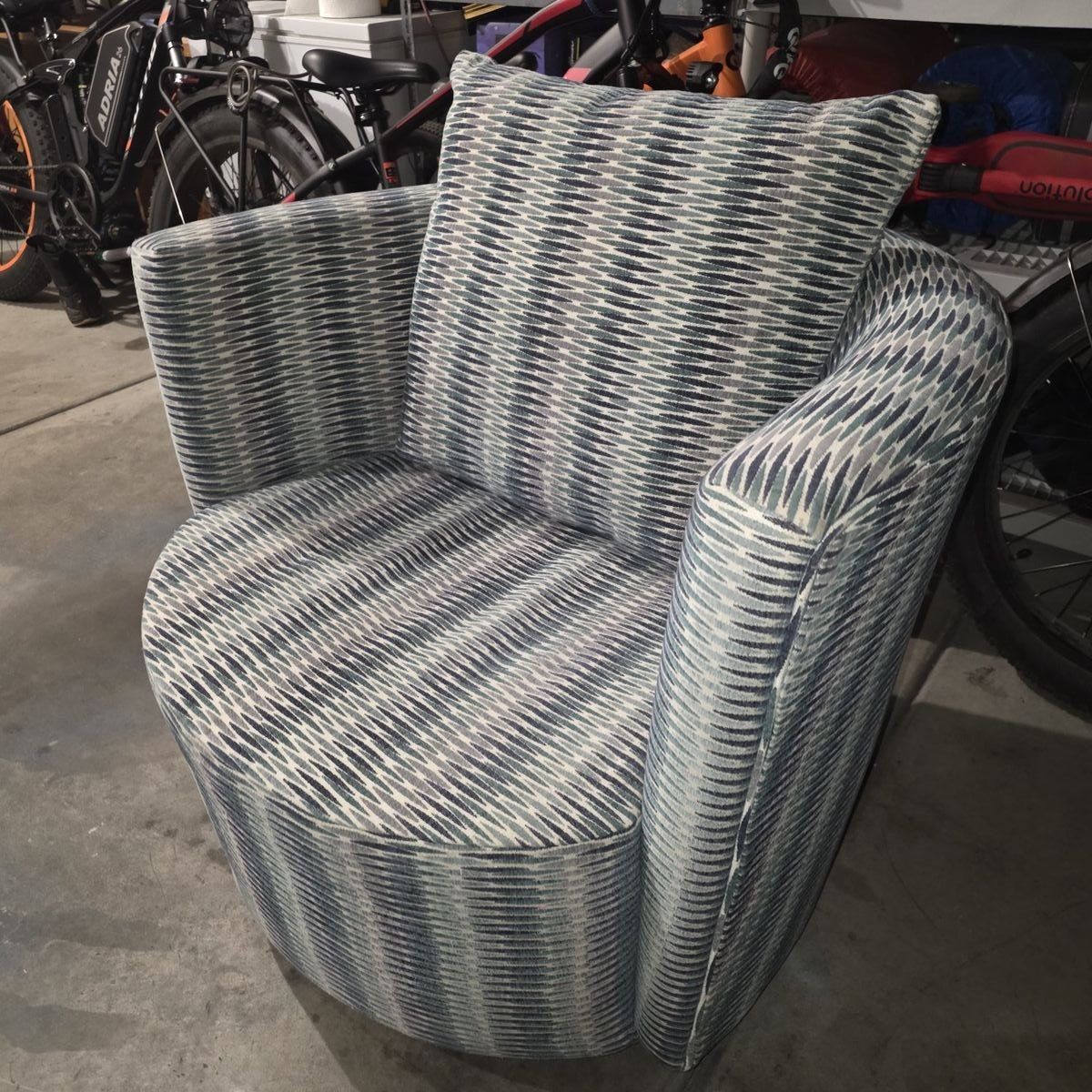 Turquoise, white and blue swivel  chair 75 bucks