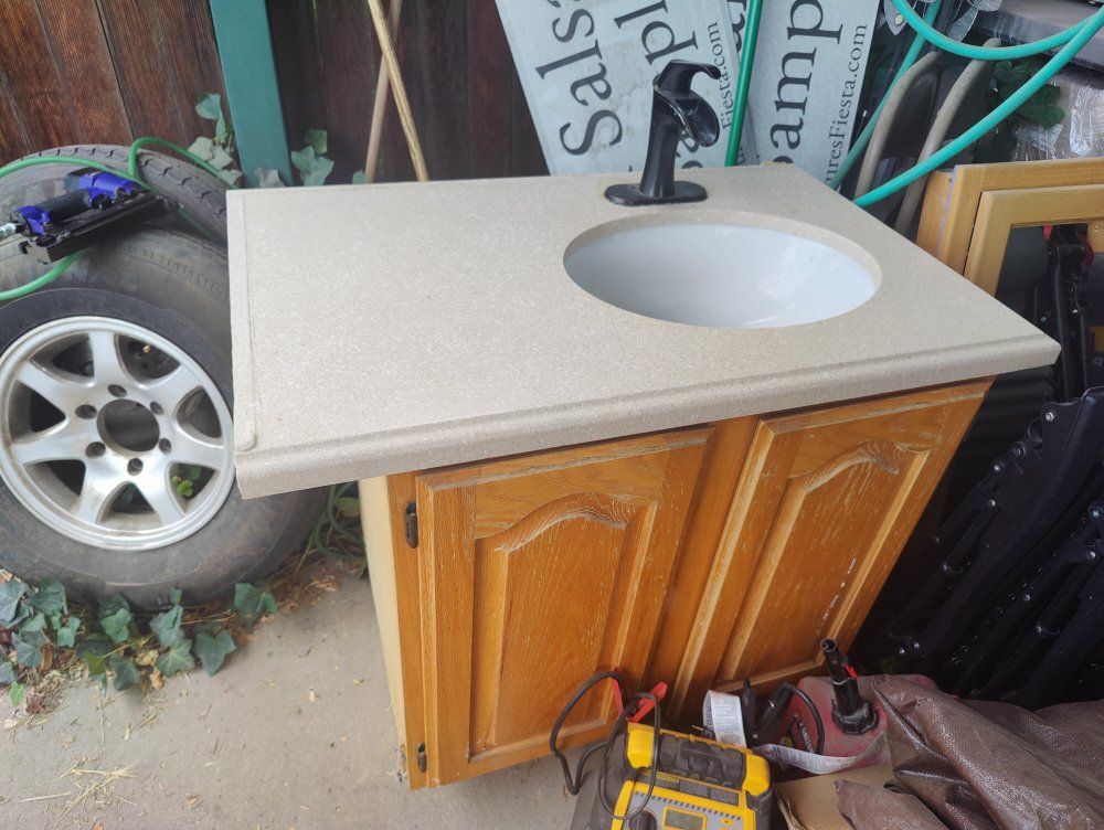 bathroom sink and vanity cabinet