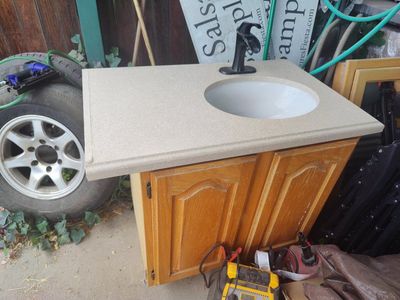 bathroom sink and vanity cabinet