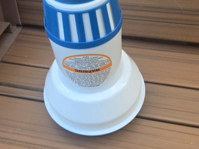 Floating chlorine tablet dispenser