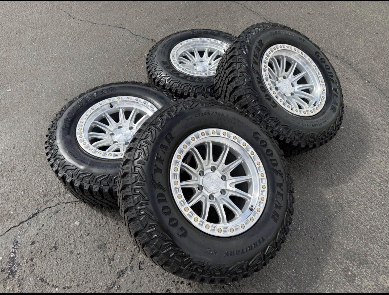 New Silver Arena LT285/70r17 Goodyear 6x5.5 Chevy