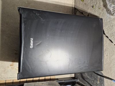 Galanz compact mini refrigerator in black. It