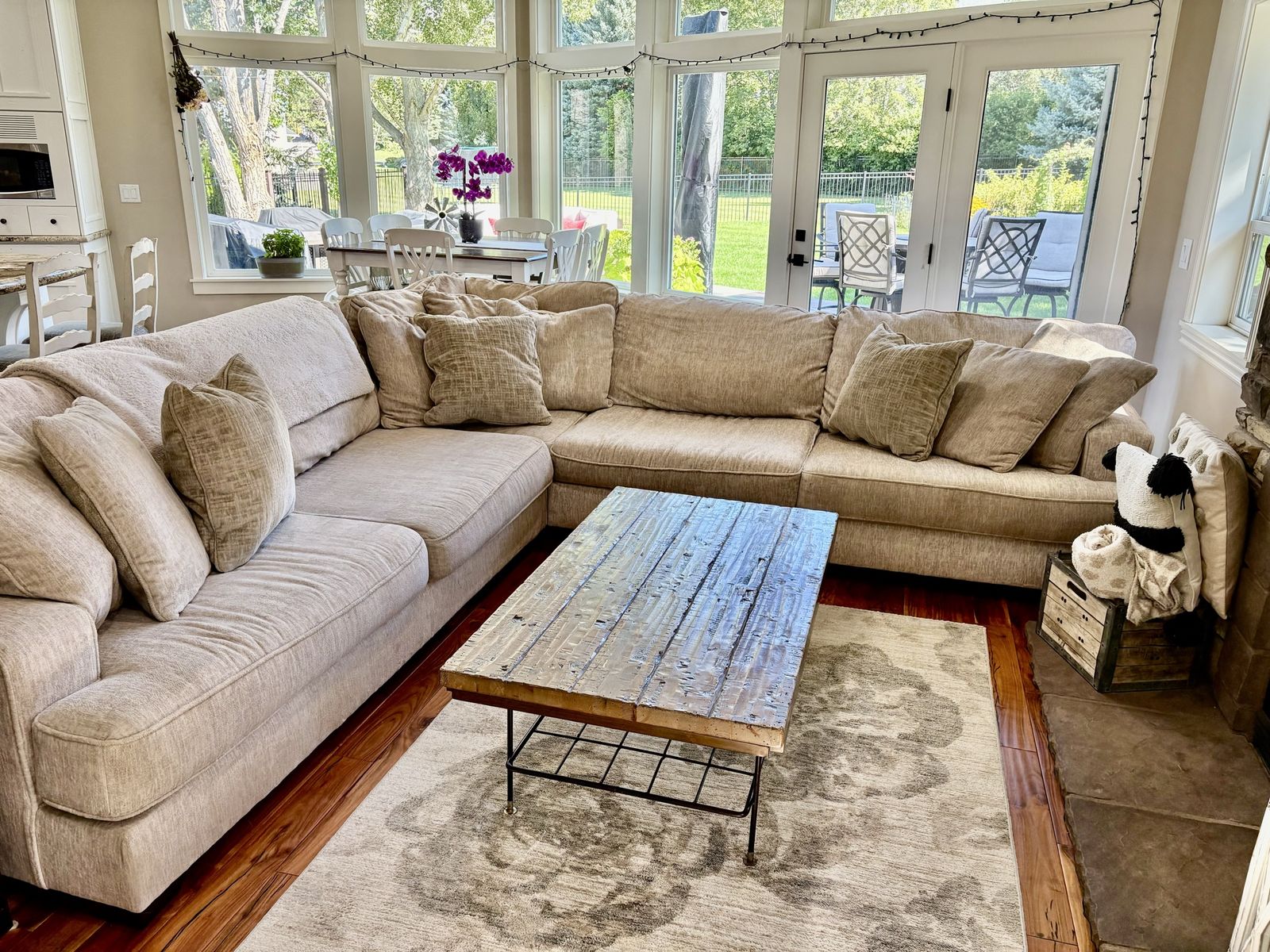 Large Beige Sectional Sofa with Accent Pillows