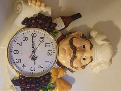 Fat Chef, kitchen decor set, Cookie Jar, Wall Clock, Canister, valances and pictures.