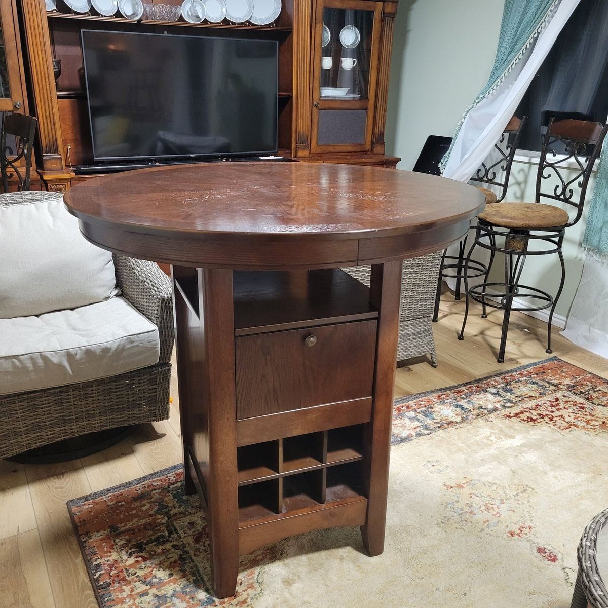 bar height table with 4 swivel chairs