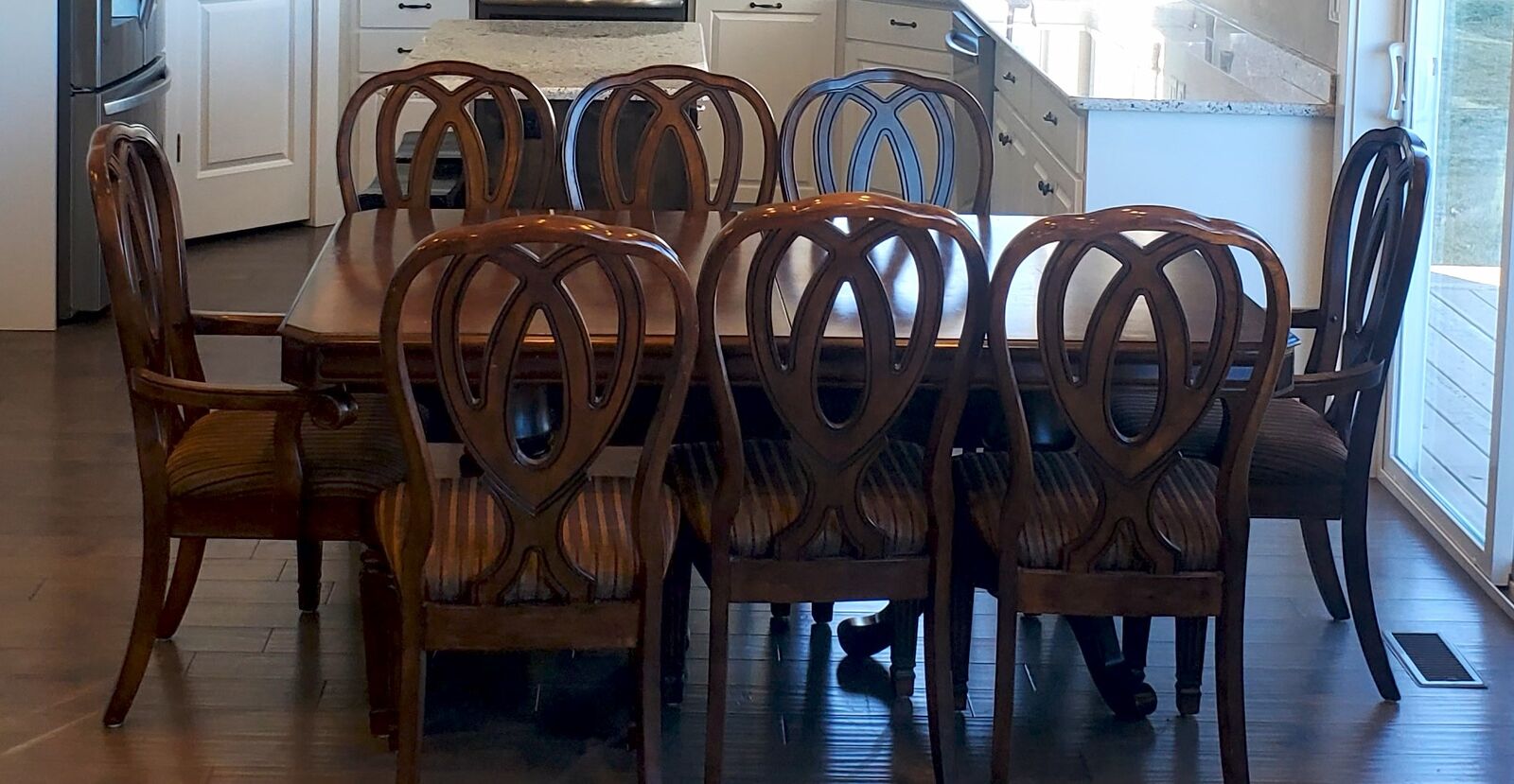 Table with leaf and 8 chairs