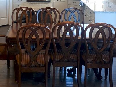 Table with leaf and 8 chairs