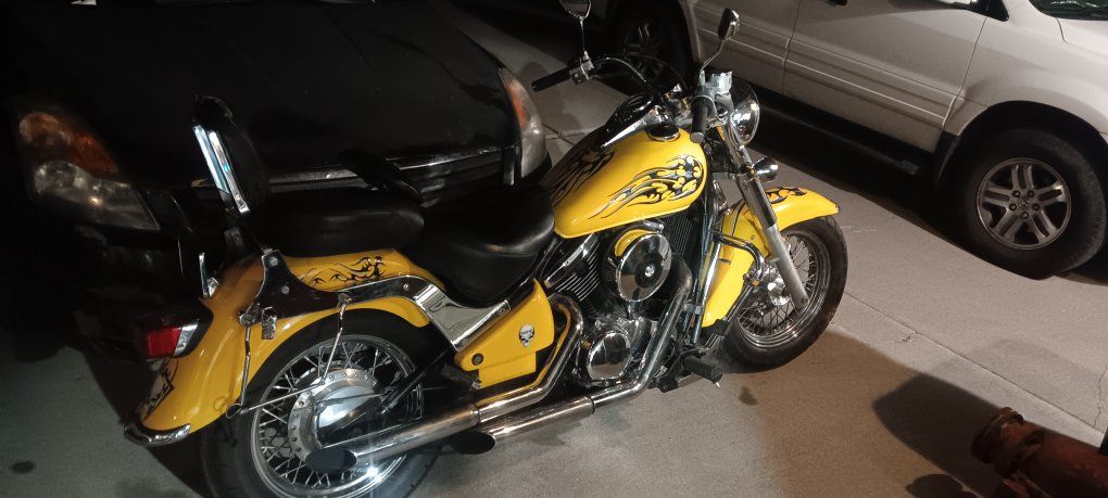 Kawasaki yellow Custom Cruiser Motorcycle with Skull & Flame Decals