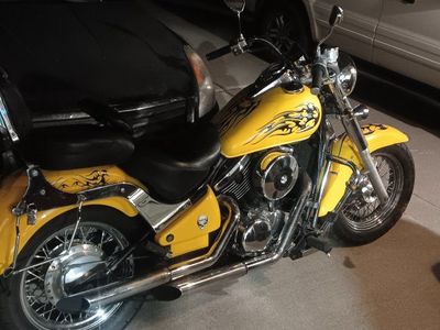 Kawasaki yellow Custom Cruiser Motorcycle with Skull & Flame Decals
