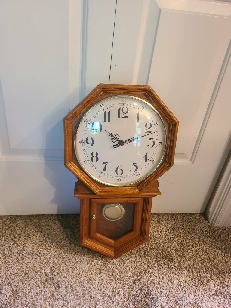 wooden pendulum wall clock