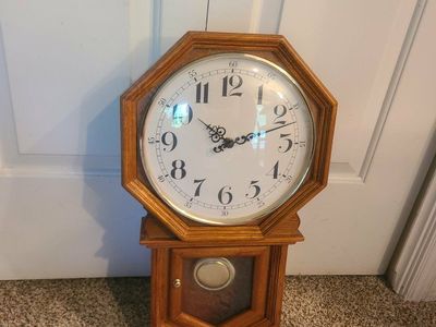 wooden pendulum wall clock
