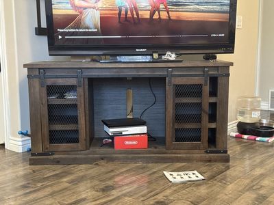 Rustic Farmhouse Style TV Stand with Sliding Mesh Doors - Dark Wood Finish