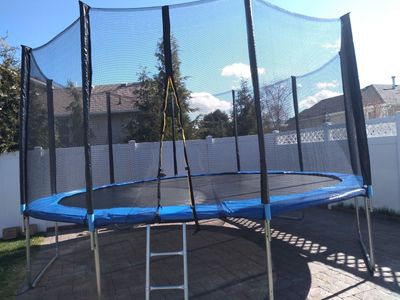 Trampoline with enclosure