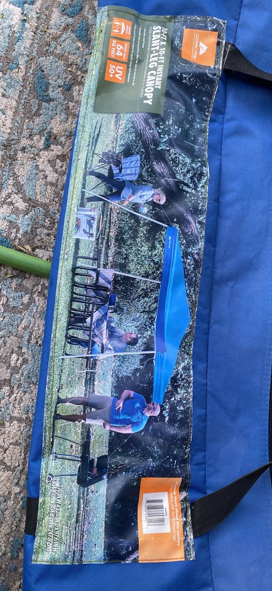 New. Ozark Trail 10x10 Instant Slant Leg Canopy Blue 50+ UV
