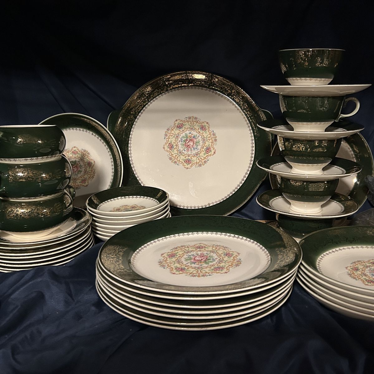Never-Used 42 piece HARMONY HOUSE Dish Set has elegant 23K Gold Filigree over a Dk Green Rim Framing a Pink Rose Mandala