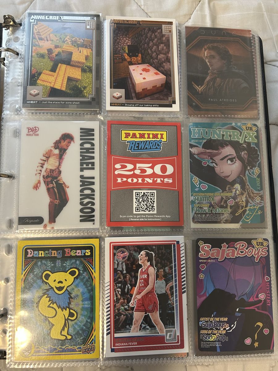 Binder full of cards random and sports rare