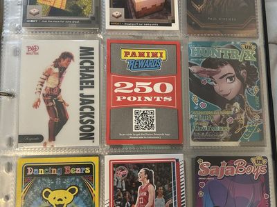 Binder full of cards random and sports rare
