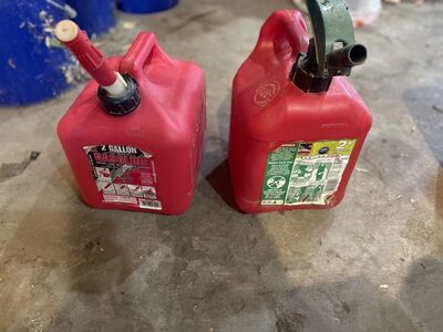 Two 2 Gallon Gas Cans