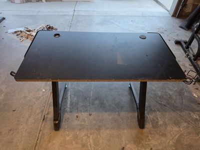 Black Gaming Desk with Z-Shaped Legs and Cable Management Grommets
