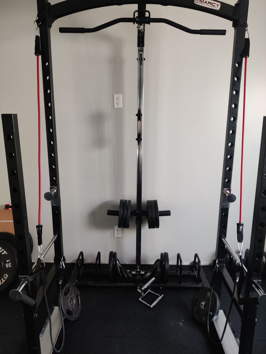 Marcy weight rack with weight and pulley systems