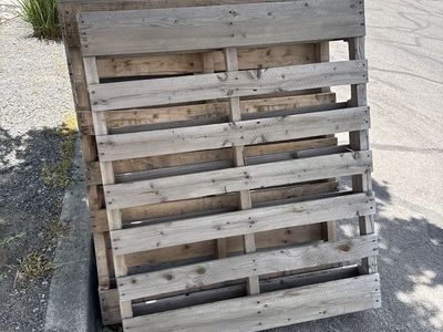 Free Stack of 4 Used Wood Pallets - Ideal for DIY Projects & Shipping