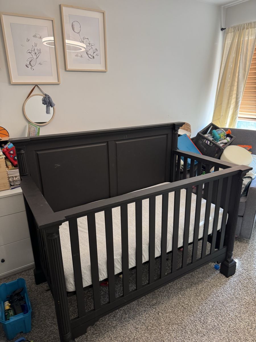 Convertible crib to toddler bed.
