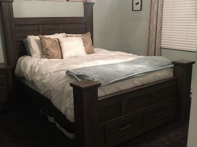 Queen size poster bed with storage. Nice solid bed. See description for what is included.